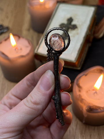 Hematite in Quartz Wand